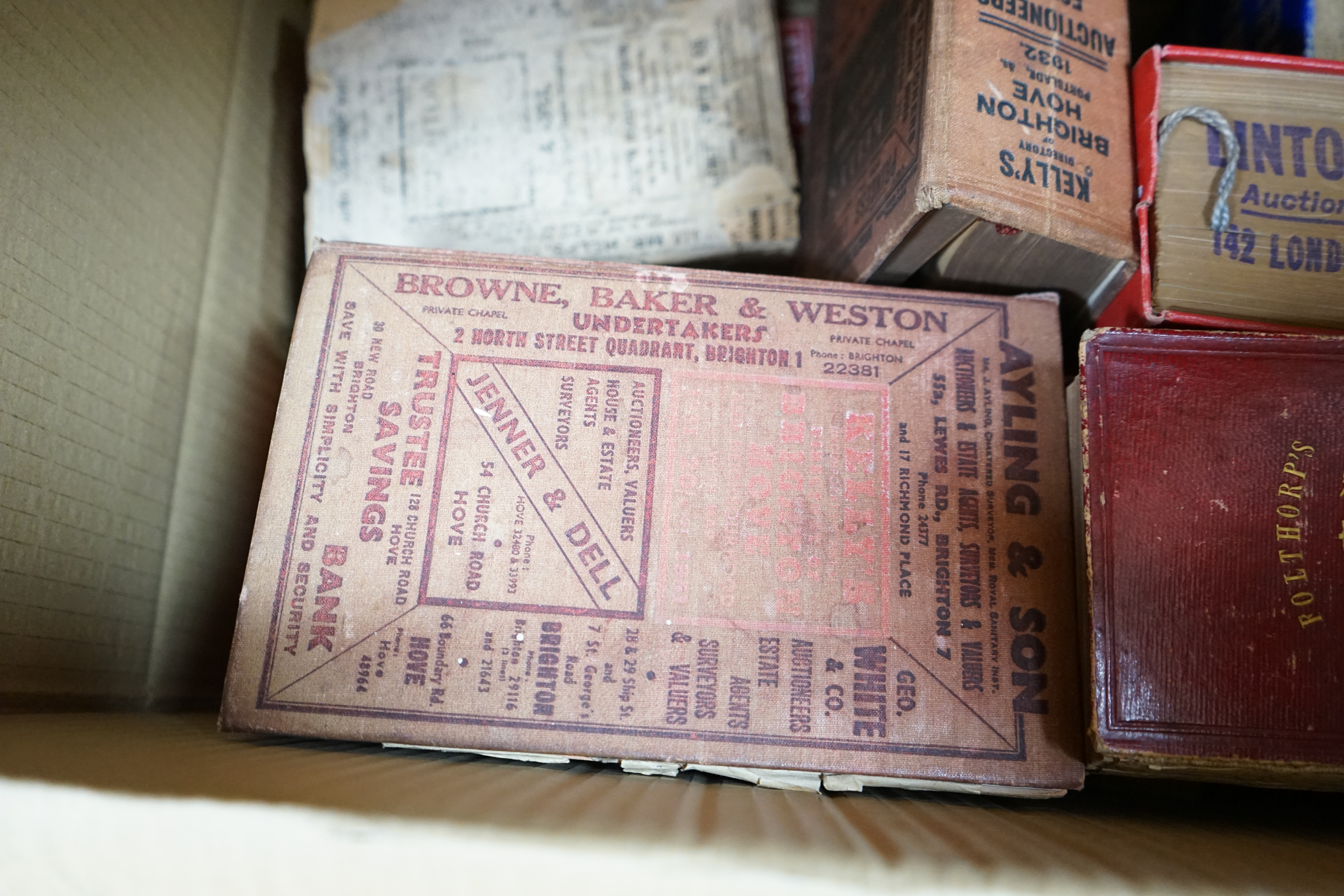 A collection of Brighton Directories, 1856 onwards (one box). Condition - poor to fair, some bindings loose and covers detached or faded